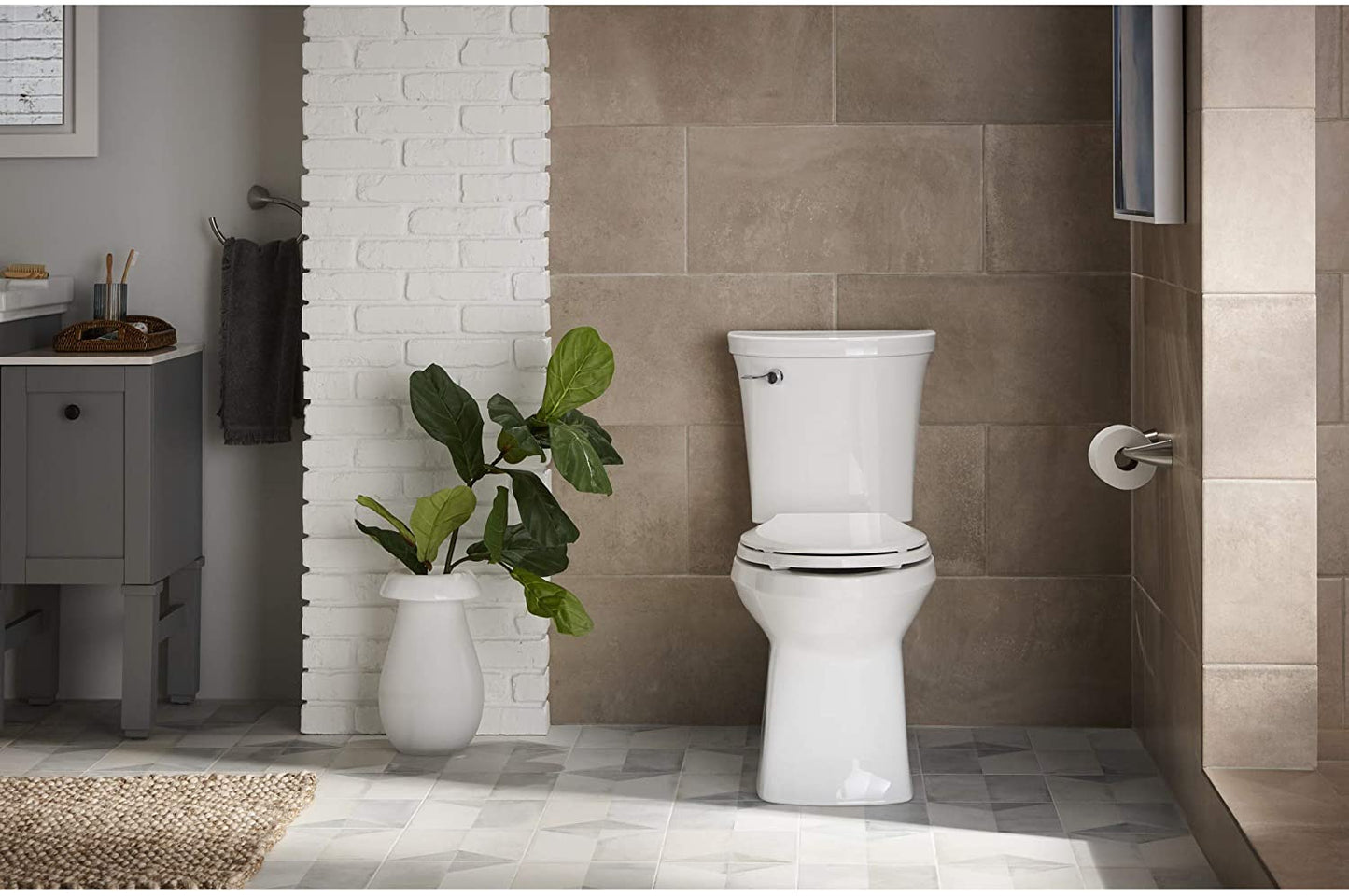 Kohler valiant the Complete Solution 2-Piece 1.28 GPF Single-Flush Elongated Toilet in White.