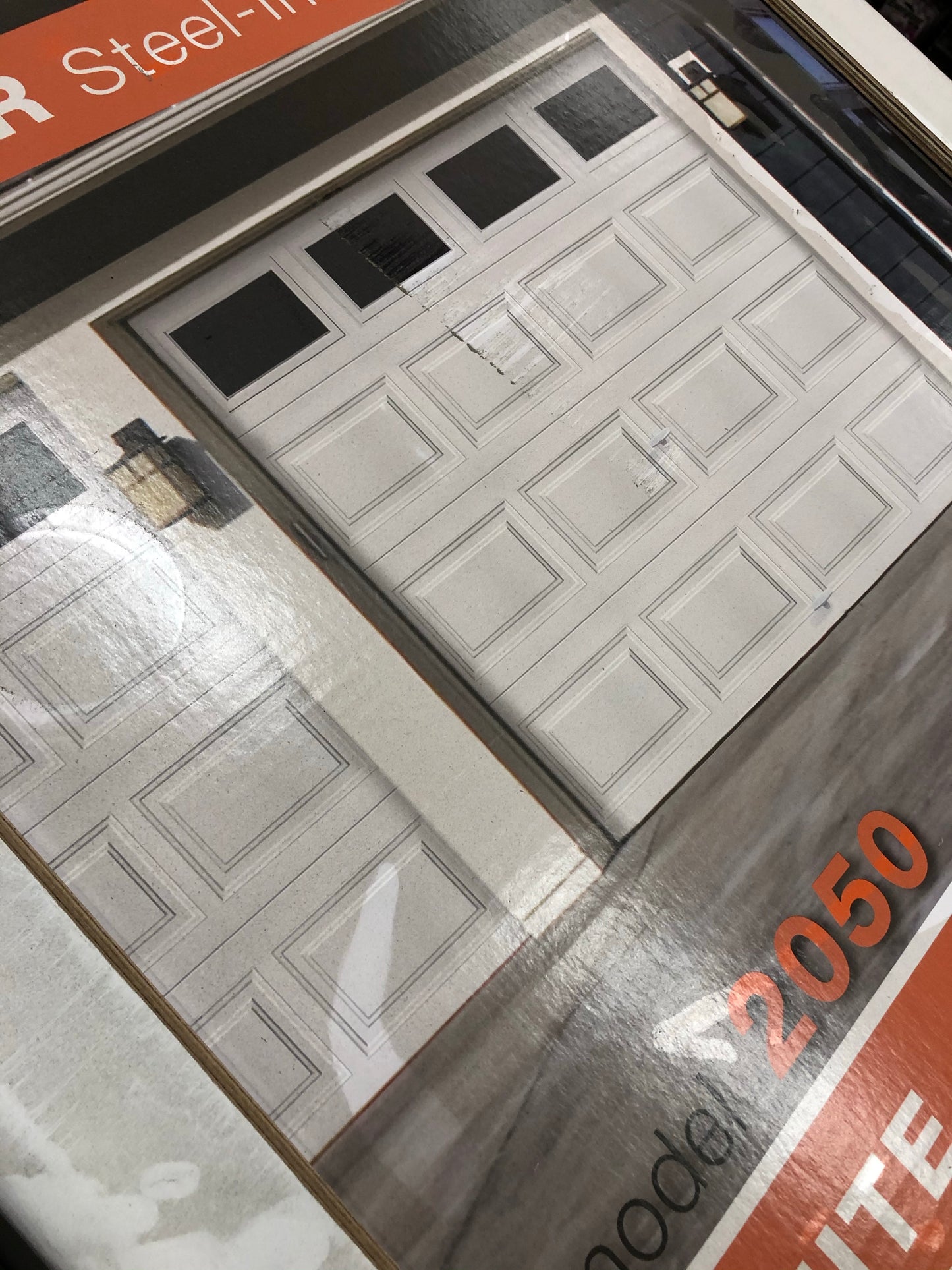 Clopay Classic Collection 8 ft. x 7ft. 6.5 R-Value Insulated White Garage Door with Plain Windows.